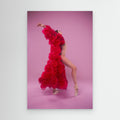 young female ballerina in a photo studio in a cape dress made of rose flowers shows ballet movements by Alexandr Canvas